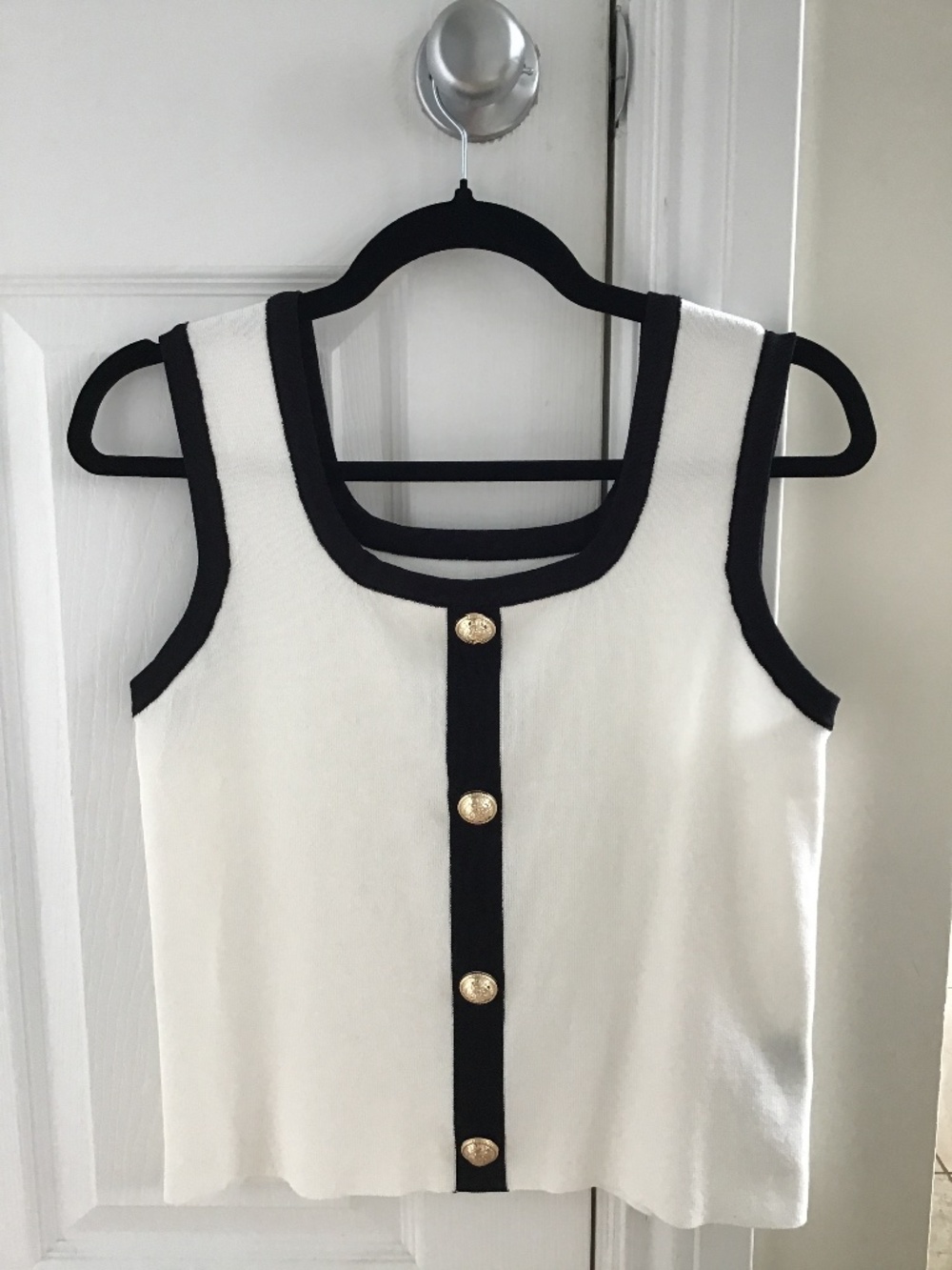 Beautiful white/black viscose sleeveless knit top with metal buttons size M